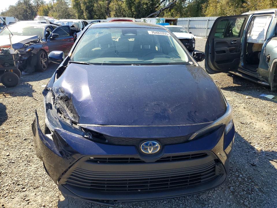 Photo 5 from auction – 2025 TOYOTA COROLLA with VIN JTDBCMFEXS3071959