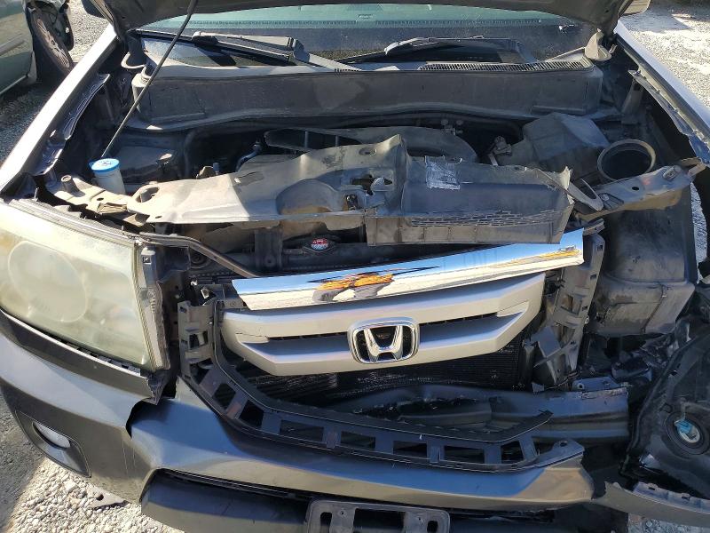Photo 12 from auction – 2011 HONDA PILOT with VIN 5FNYF3H6XBB044913