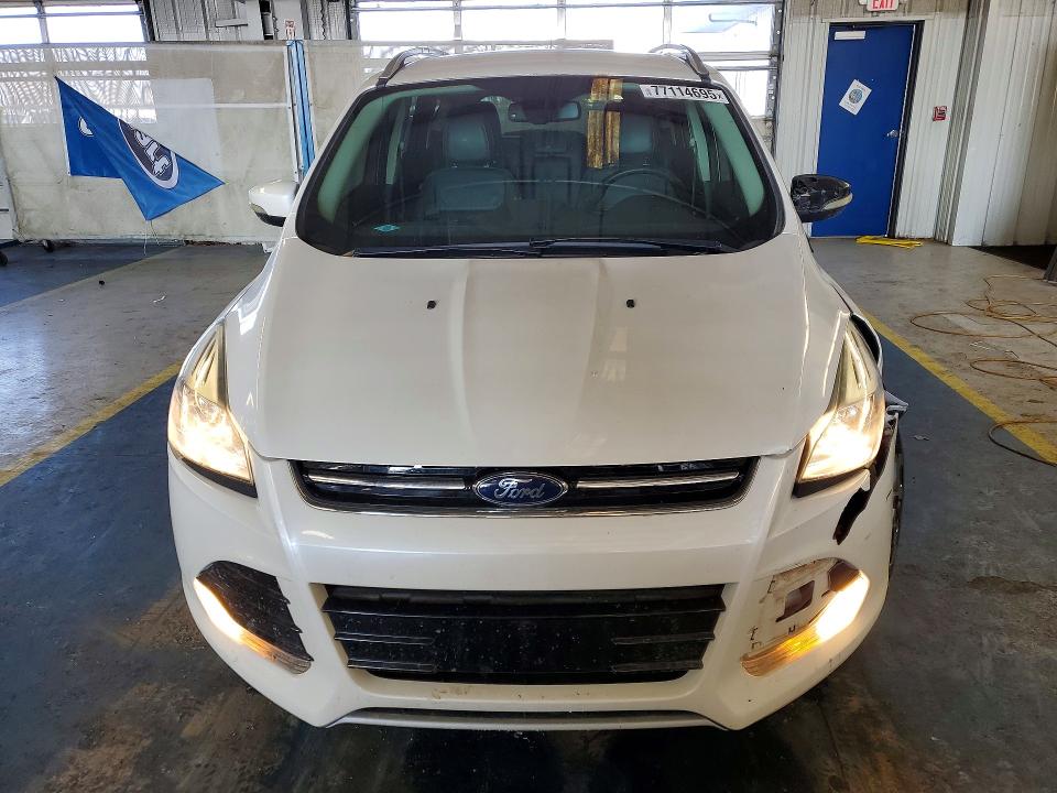 Photo 5 from auction – 2016 FORD ESCAPE with VIN 1FMCU9J9XGUC87686