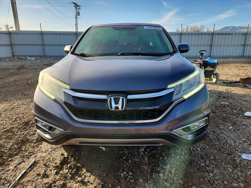 Photo 5 from auction – 2015 HONDA CR-V EX with VIN 3CZRM3H58FG706709