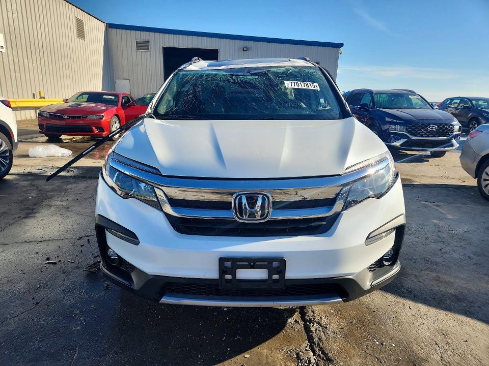 Photo 5 from auction – 2022 HONDA PILOT EXL with VIN 5FNYF6H52NB009201