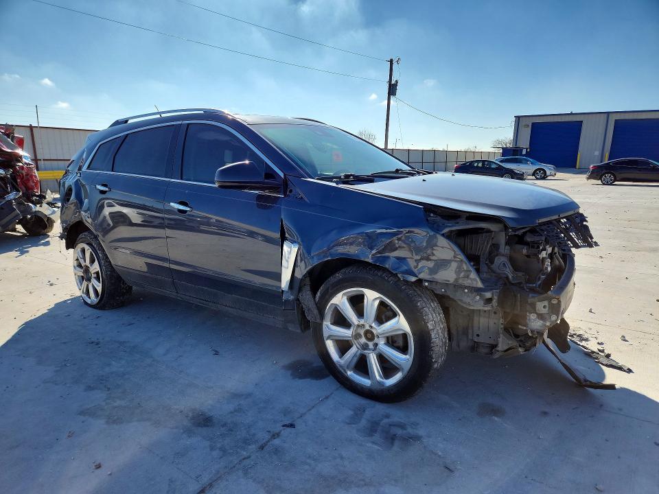 Photo 4 from auction – 2013 CADILLAC SRX PERFOR with VIN 3GYFNDE39DS527680