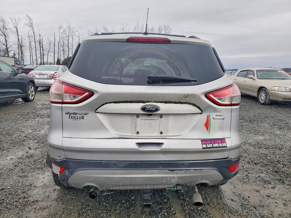 Photo 6 from auction – 2016 FORD ESCAPE with VIN 1FMCU9GX4GUB35943