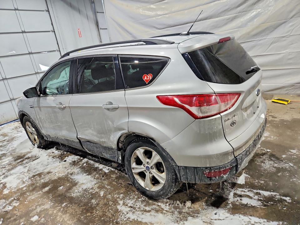Photo 2 from auction – 2014 FORD ESCAPE with VIN 1FMCU9GX0EUD76217