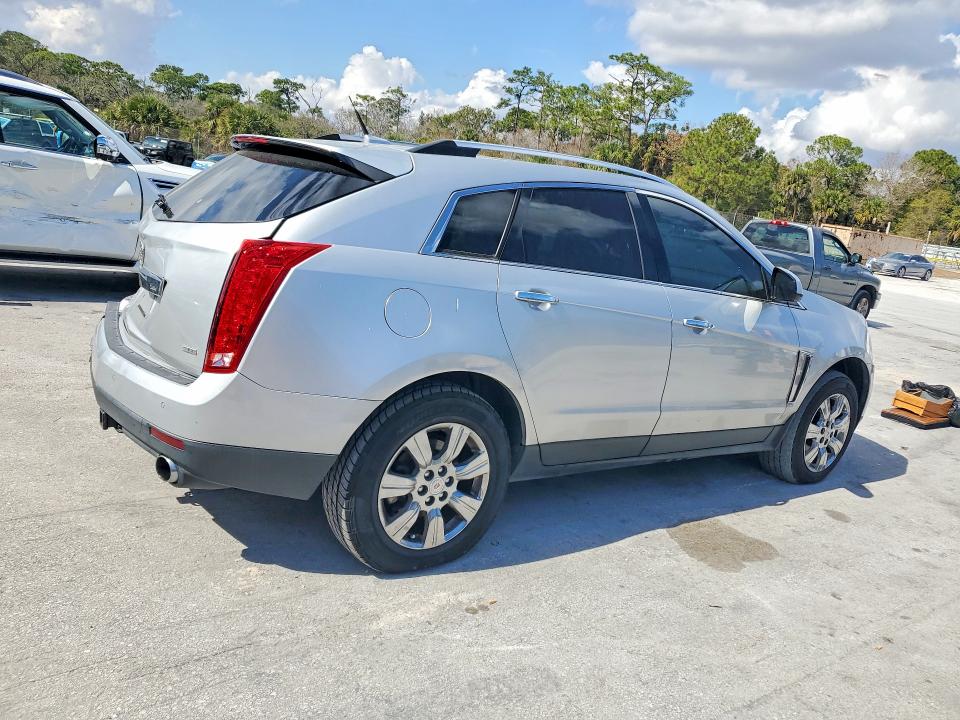 Photo 3 from auction – 2014 CADILLAC SRX LUXURY with VIN 3GYFNEE35ES667734
