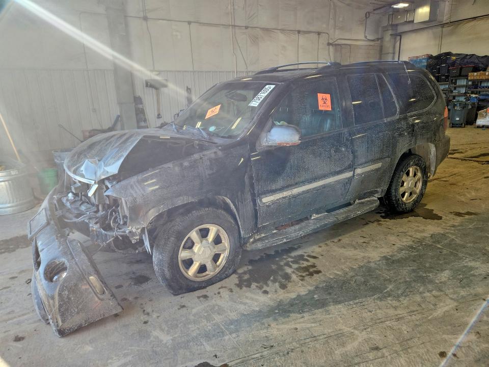 GMC ENVOY 2002 with VIN 1GKDT13S022127614 - Photo from auction