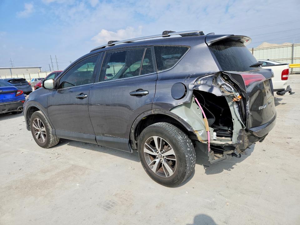 Photo 2 from auction – 2016 TOYOTA RAV4 with VIN JTMWFREV4GJ080263