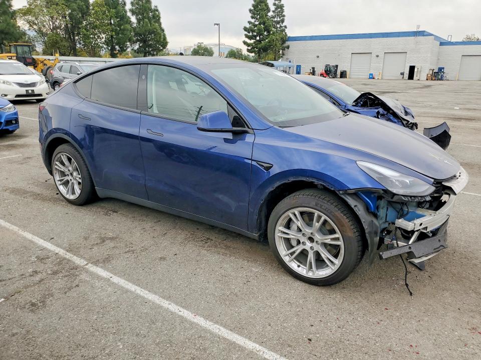 Photo 4 from auction – 2023 TESLA MODEL Y with VIN 7SAYGDED8PF957377