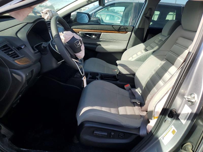 Photo 7 from auction – 2018 HONDA CR-V with VIN 7FARW2H50JE024159