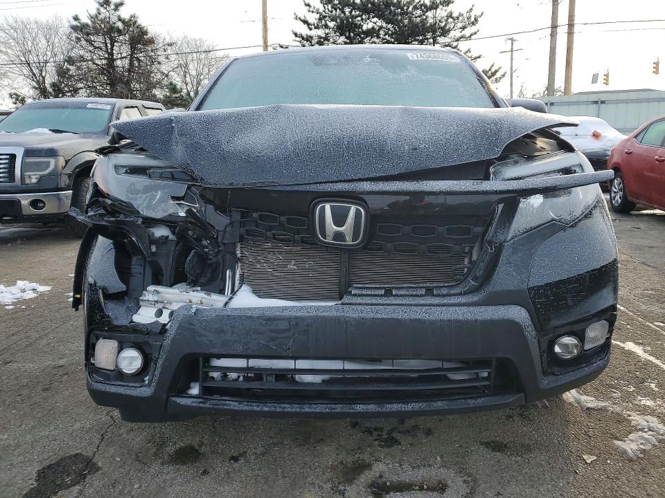 Photo 5 from auction – 2021 HONDA PASSPORT S with VIN 5FNYF8H24MB030468