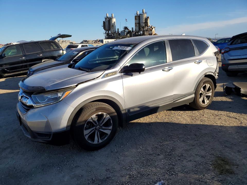 HONDA CR-V LX 2017 with VIN 7FARW5H34HE011117 - Photo from auction