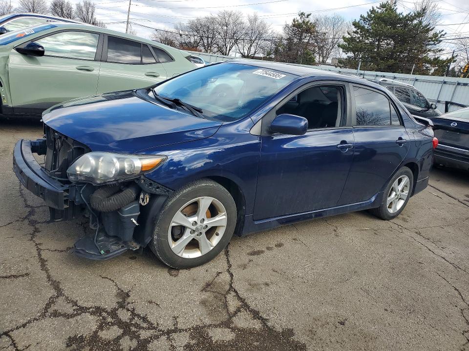 TOYOTA COROLLA 2011 with VIN 2T1BU4EEXBC740995 - Photo from auction