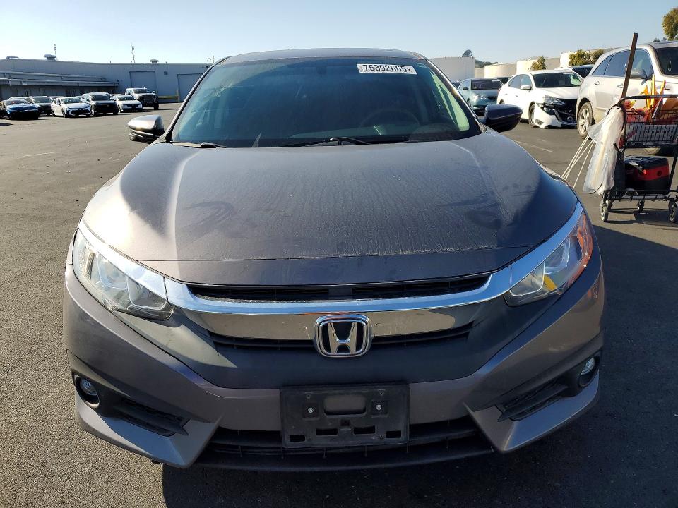 Photo 5 from auction – 2016 HONDA CIVIC EX with VIN 2HGFC1F35GH630628