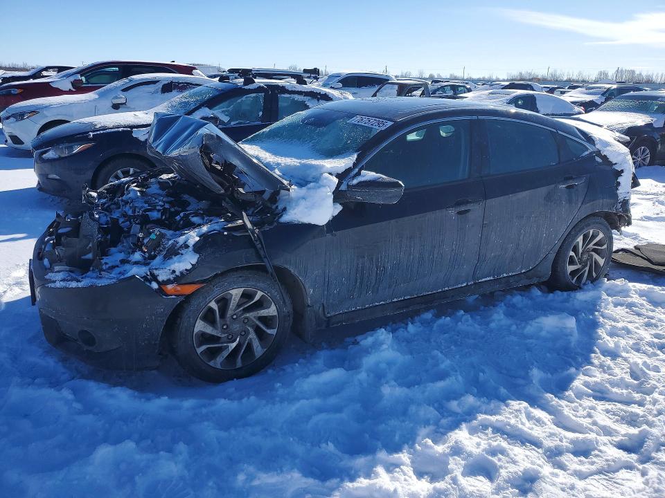 HONDA CIVIC EX 2017 with VIN 2HGFC2F85HH020943 - Photo from auction