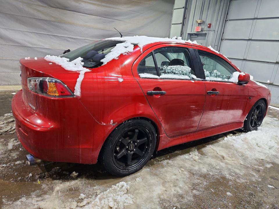 Photo 3 from auction – 2011 MITSUBISHI LANCER with VIN JA32U2FUXBU029437