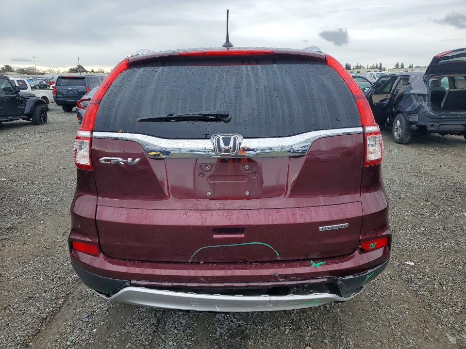 Photo 6 from auction – 2015 HONDA CR-V TOURI with VIN 5J6RM3H97FL014009