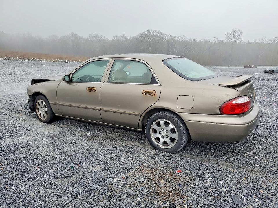 Photo 2 from auction – 2001 MAZDA 626 with VIN 1YVGF22C815237138