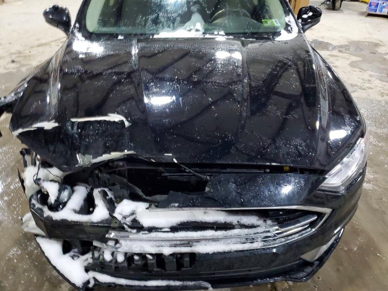 Photo 11 from auction – 2018 FORD FUSION with VIN 3FA6P0G74JR157739