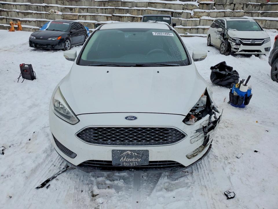 Photo 5 from auction – 2016 FORD FOCUS with VIN 1FADP3F27GL368651