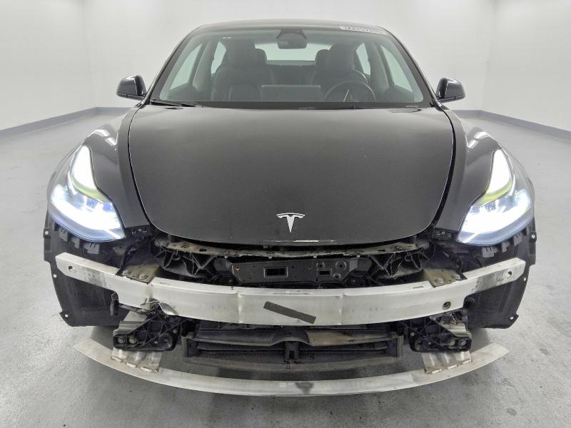 Photo 5 from auction – 2022 TESLA MODEL 3 with VIN 5YJ3E1EA3NF191119