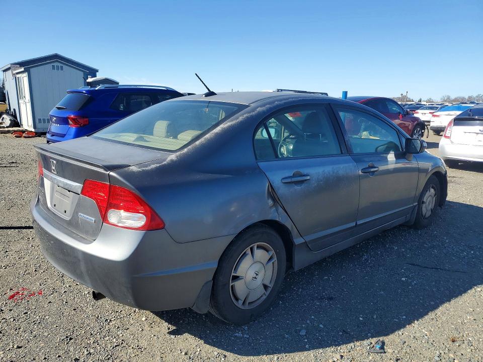 Photo 3 from auction – 2010 HONDA CIVIC HYBR with VIN JHMFA3F23AS003156