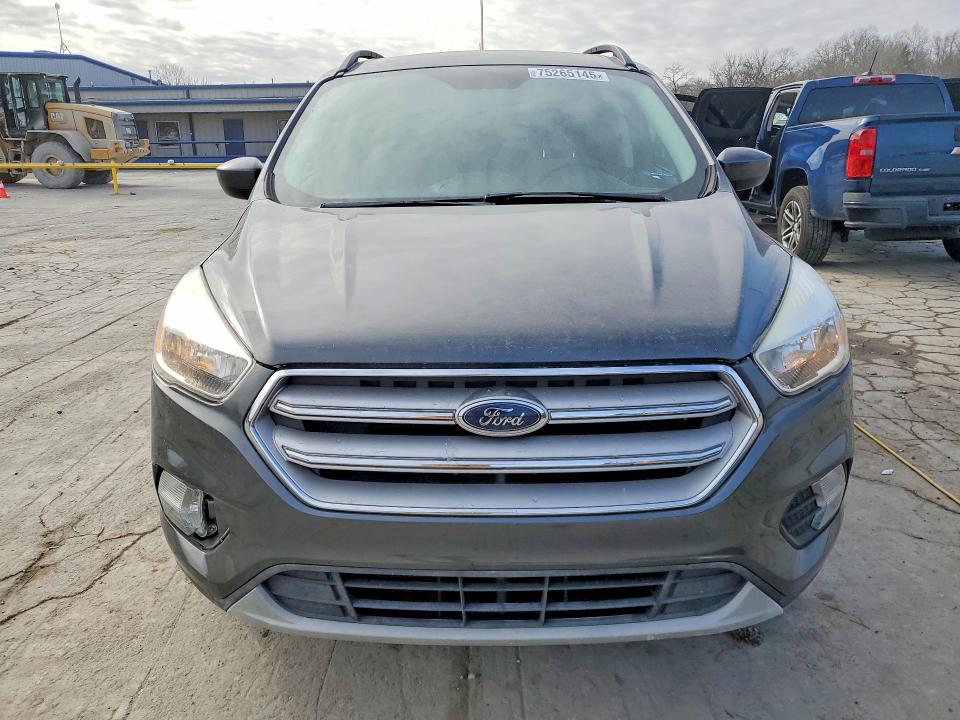 Photo 5 from auction – 2018 FORD ESCAPE with VIN 1FMCU9GD9JUD38873