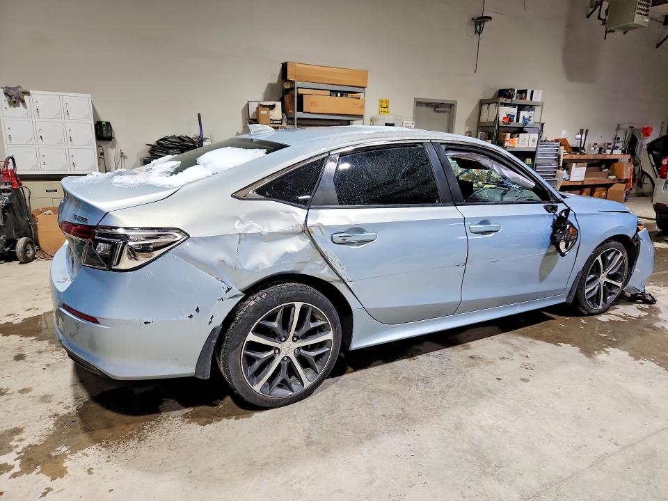 Photo 3 from auction – 2022 HONDA CIVIC with VIN 2HGFE1F95NH309992