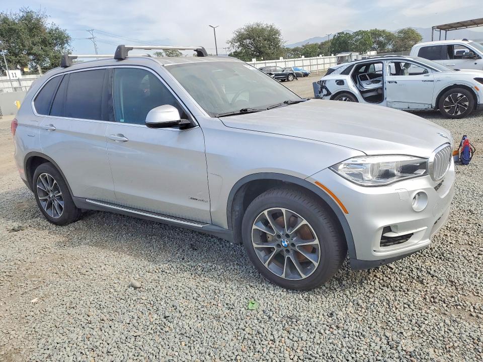 Photo 4 from auction – 2014 BMW X5 XDRIVE3 with VIN 5UXKS4C52E0J94246