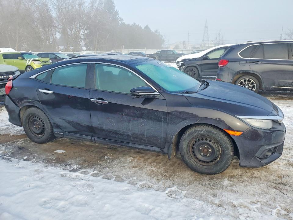 Photo 4 from auction – 2016 HONDA CIVIC TOUR with VIN 2HGFC1F91GH112875