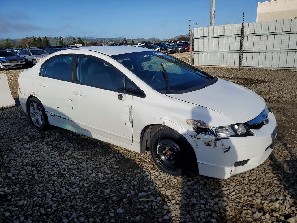 Photo 4 from auction – 2011 HONDA CIVIC with VIN 19XFA1F60BE044728