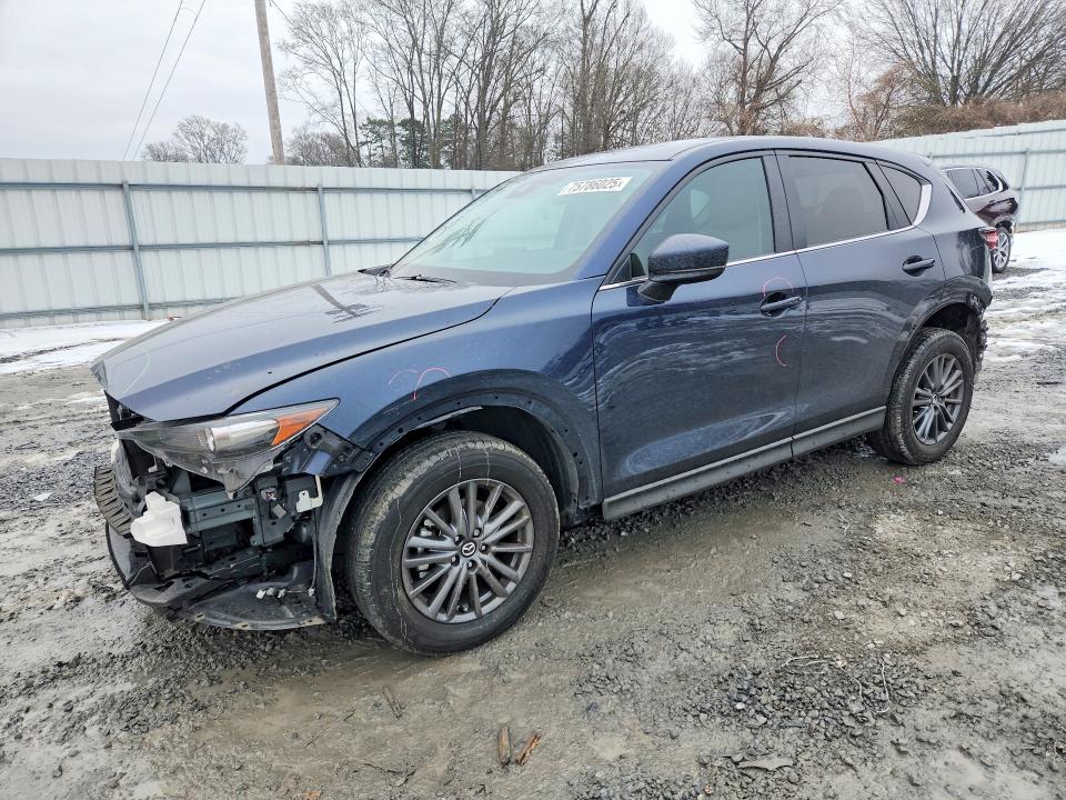 MAZDA CX-5 2021 with VIN JM3KFACMXM0361132 - Photo from auction