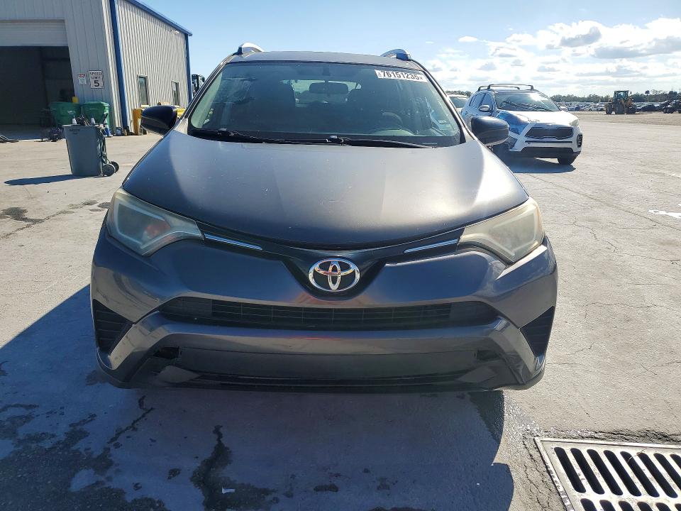 Photo 5 from auction – 2016 TOYOTA RAV4 LE with VIN JTMZFREV5GJ086599