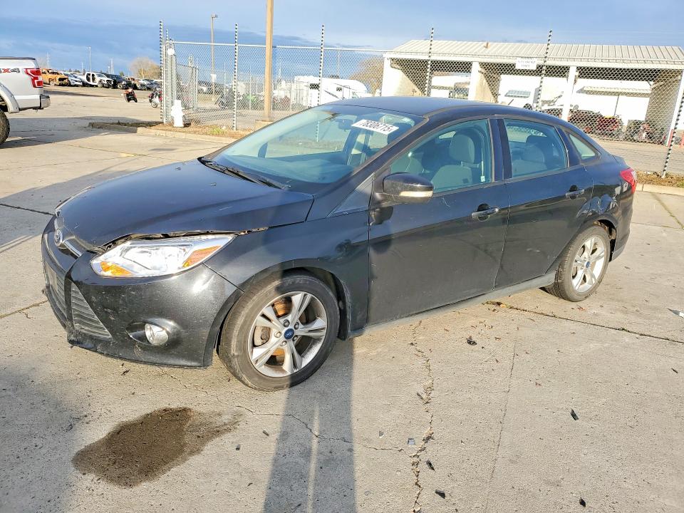 FORD FOCUS 2014 with VIN 1FADP3F2XEL111691 - Photo from auction