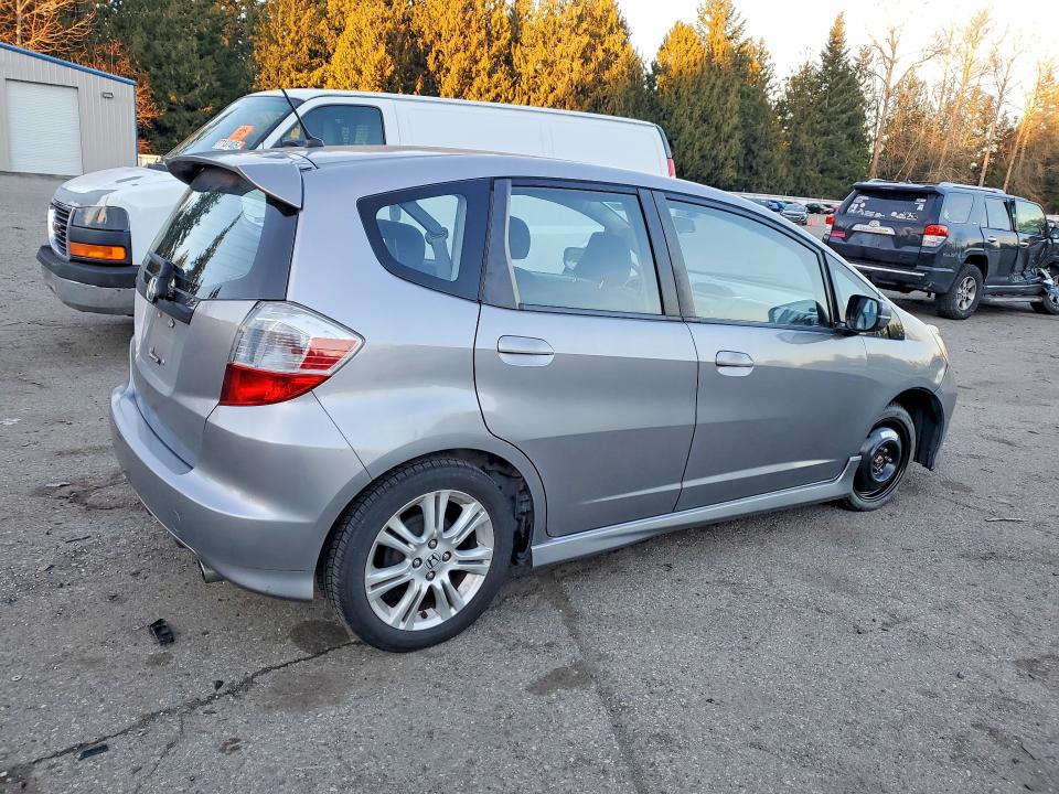 Photo 3 from auction – 2009 HONDA FIT with VIN JHMGE88429S001916
