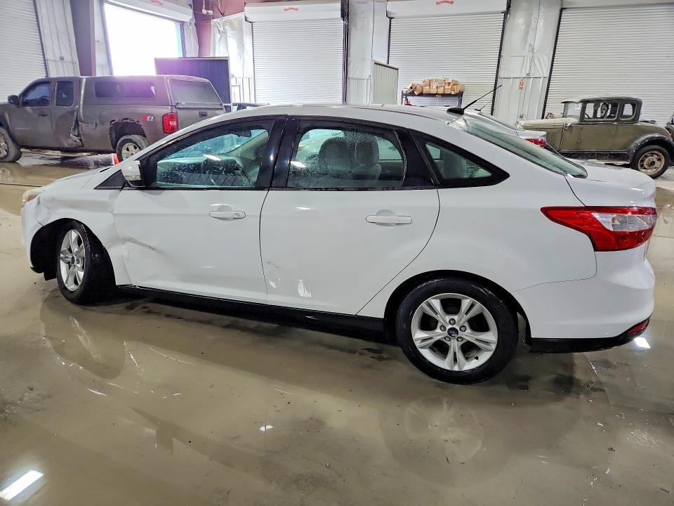 Photo 2 from auction – 2014 FORD FOCUS SE with VIN 1FADP3F20EL334421