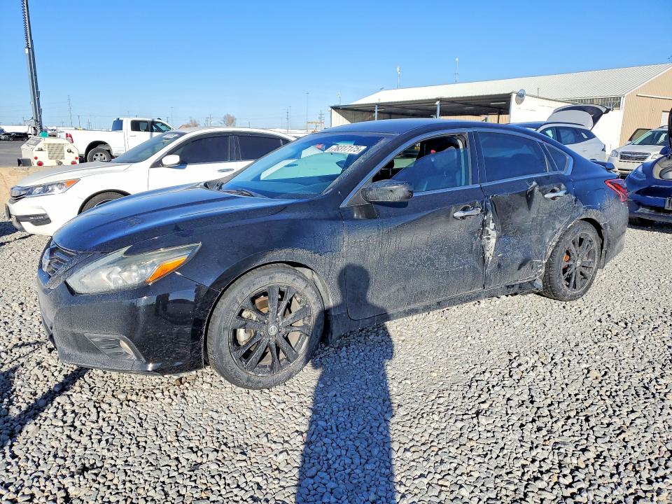 NISSAN ALTIMA 2018 with VIN 1N4AL3AP4JC299510 - Photo from auction