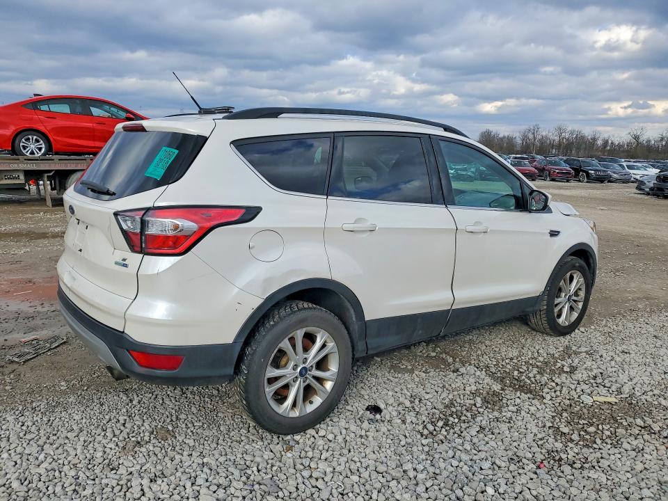 Photo 3 from auction – 2018 FORD ESCAPE with VIN 1FMCU9GD5JUA36142