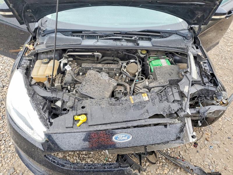 Photo 11 from auction – 2016 FORD FOCUS with VIN 1FADP3F21GL253348