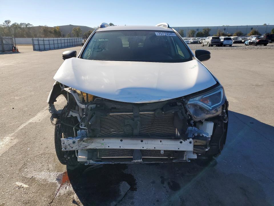 Photo 5 from auction – 2016 TOYOTA RAV4 LE with VIN JTMZFREV3GJ082518