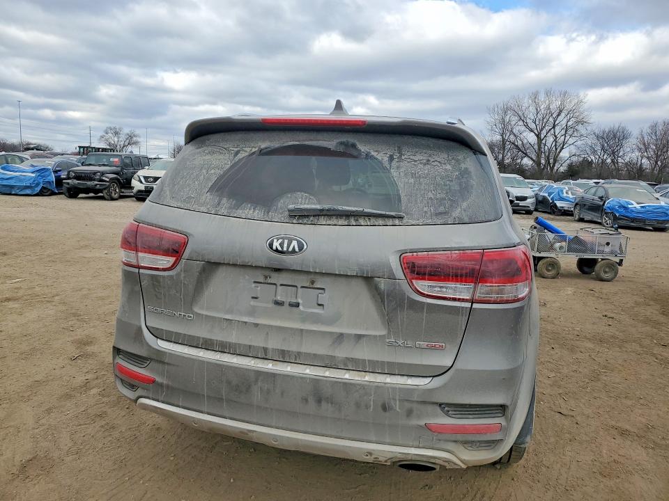 Photo 6 from auction – 2016 KIA SORENTO with VIN 5XYPK4A14GG043848