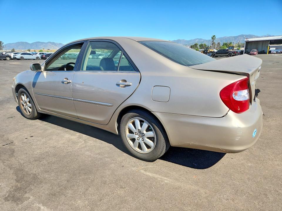 Photo 2 from auction – 2002 TOYOTA CAMRY with VIN JTDBF30K120056929