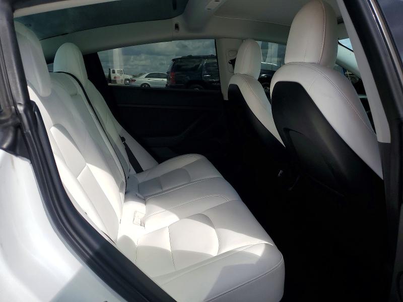 Photo 10 from auction – 2021 TESLA MODEL 3 with VIN 5YJ3E1EA3MF028811