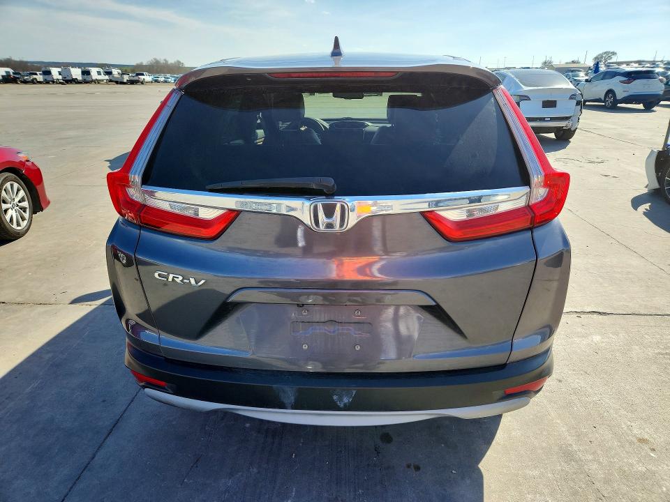 Photo 6 from auction – 2017 HONDA CR-V with VIN 7FARW1H80HE011068