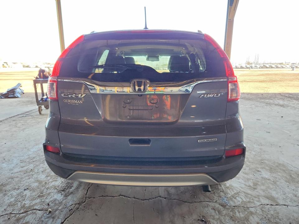 Photo 6 from auction – 2016 HONDA CR-V TOURI with VIN 5J6RM4H90GL062507