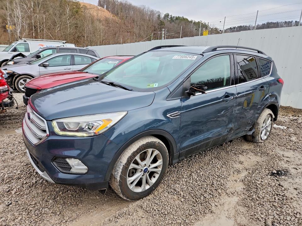 FORD ESCAPE 2019 with VIN 1FMCU9HD5KUB23992 - Photo from auction