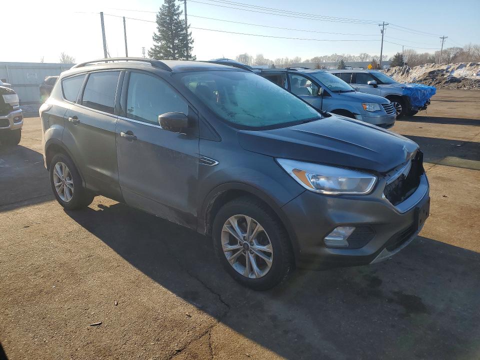 Photo 4 from auction – 2018 FORD ESCAPE with VIN 1FMCU9GD0JUC48558