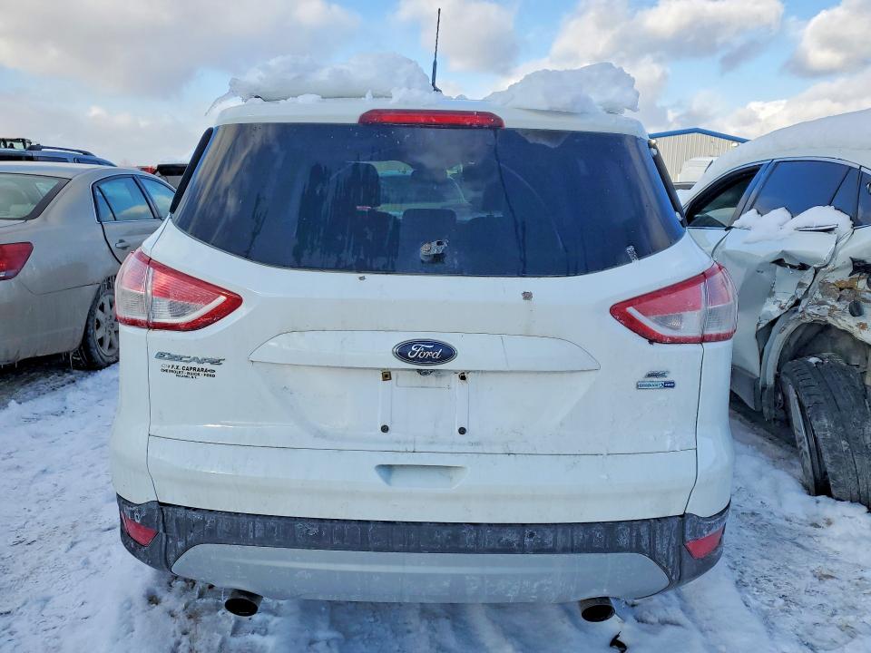 Photo 6 from auction – 2016 FORD ESCAPE with VIN 1FMCU9GX6GUB50685