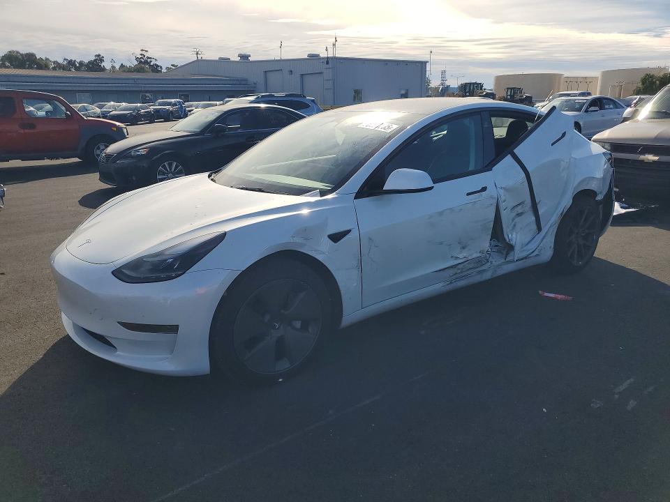 TESLA MODEL 3 2023 with VIN 5YJ3E1EA6PF403207 - Photo from auction