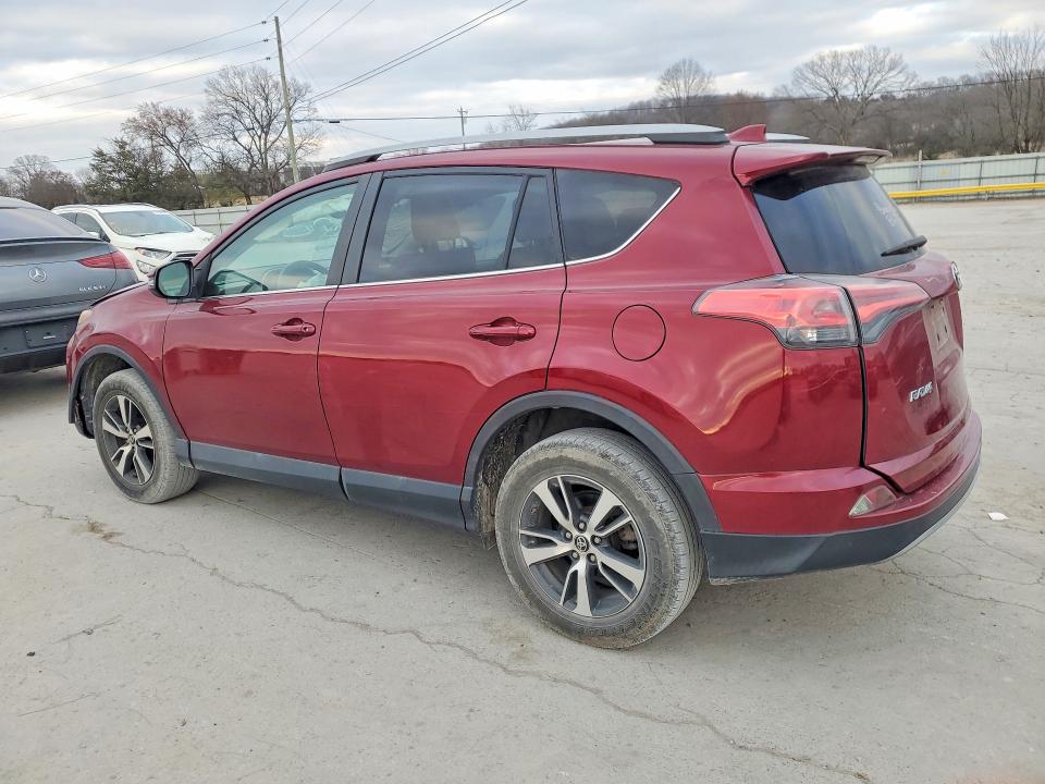 Photo 2 from auction – 2018 TOYOTA RAV4 with VIN 2T3WFREV6JW500145