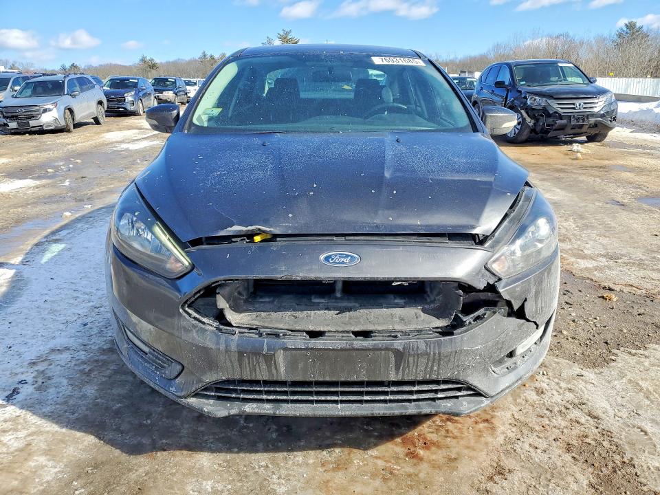 Photo 5 from auction – 2015 FORD FOCUS with VIN 1FADP3F24FL271261